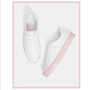 White and pink platform shoes.
